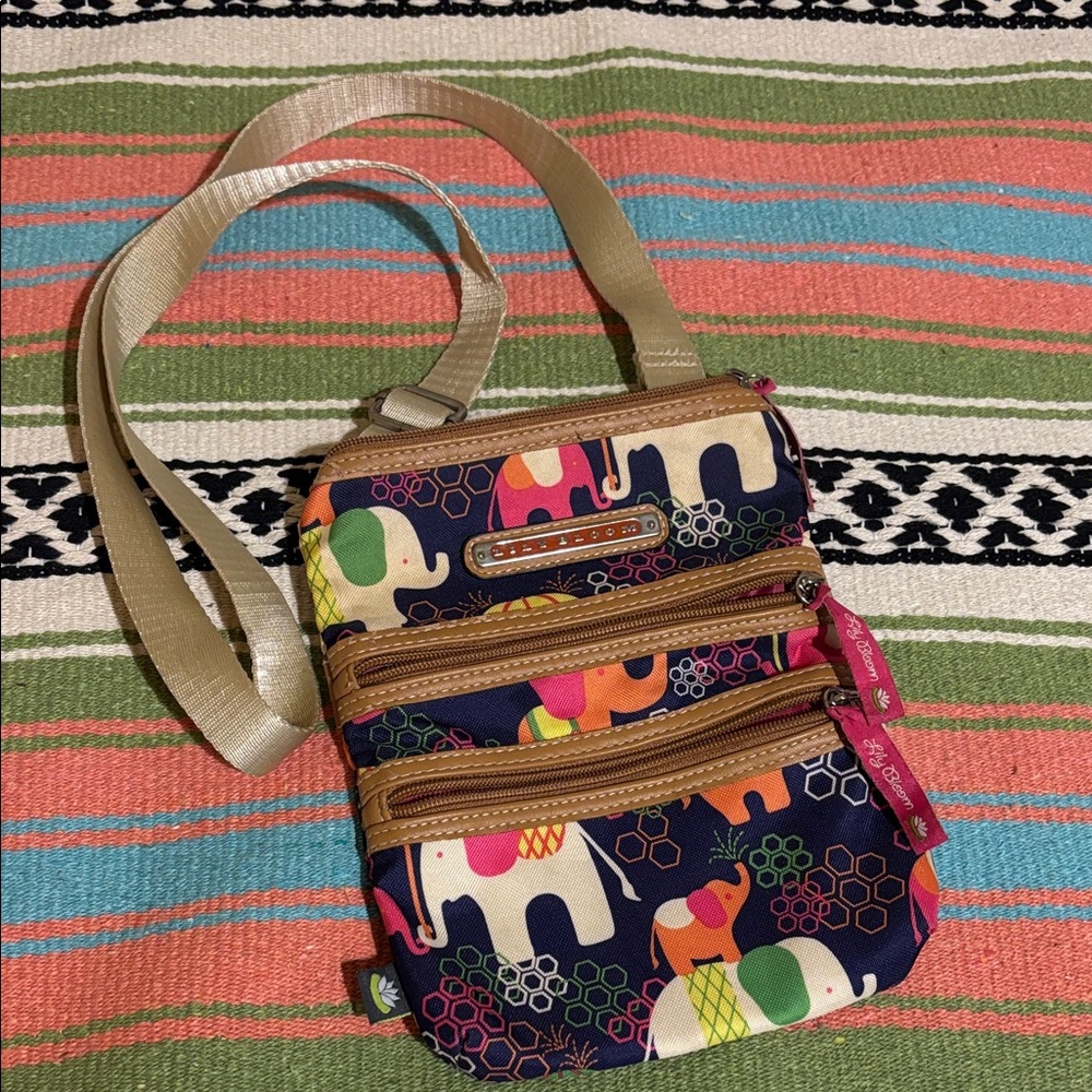 Lily Bloom Navy Crossbody with Multicolor Elephant Pattern and Tan Trim